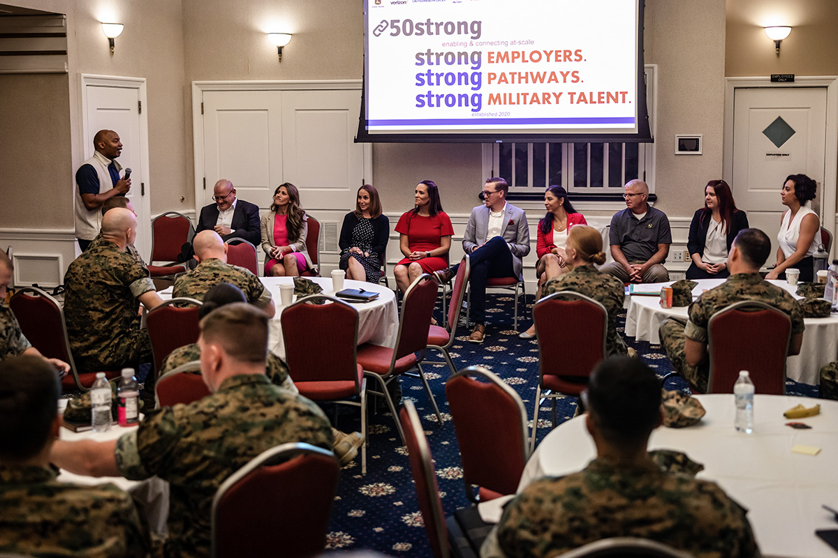 Marines and Marine Corps veterans meet in a ballroom for a Marine for Life networking event. 